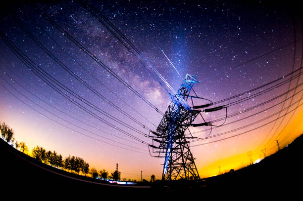 istock Electric tower at night, the Milky Way 1142970459