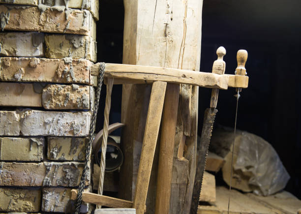 Hand drill, chisel and other tools on wooden background. Selective focus