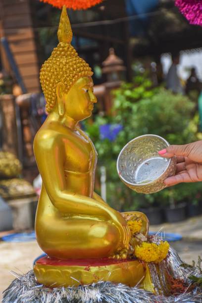 istock Bathing the Buddha image on Songkran Day in Thailand. 1142974647