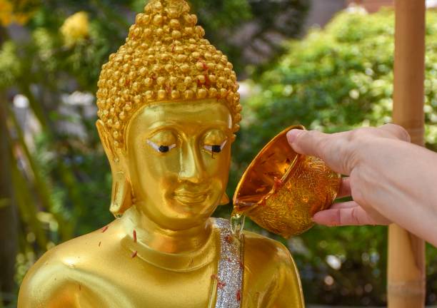 istock Bathing the Buddha image on Songkran Day in Thailand. 1142974673