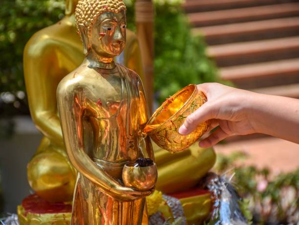 istock Bathing the Buddha image on Songkran Day in Thailand. 1142974700
