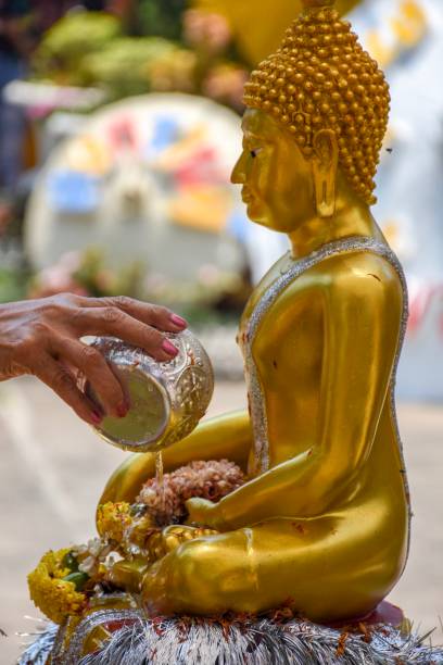 istock Bathing the Buddha image on Songkran Day in Thailand. 1142975015