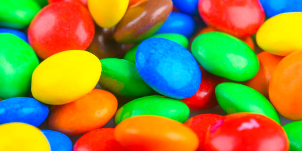 istock Colourful candy coated button shaped milk chocolates 1142985031