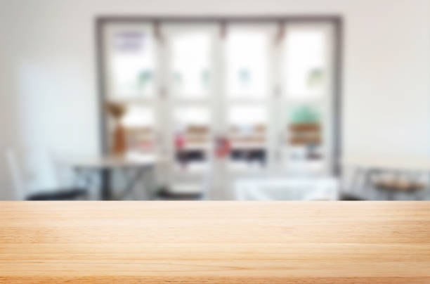 Close-Up Of Empty Table  wooden desk stock pictures, royalty-free photos & images