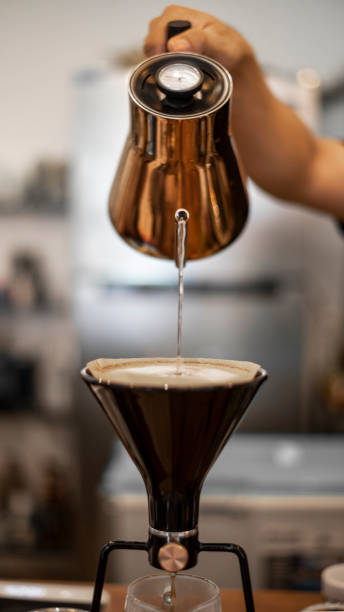 istock Hot steam dripped coffee with paper cone 1142985804
