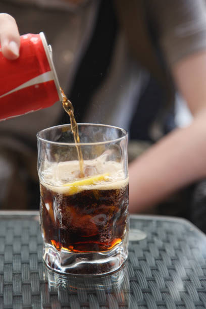 istock Cold drink in a glass with a slice of lemon 1142986203