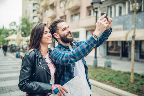 istock Man and Woman, tourists 1142986300
