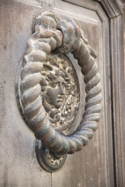 istock Decorative element of the city's  metal gate 1142986414
