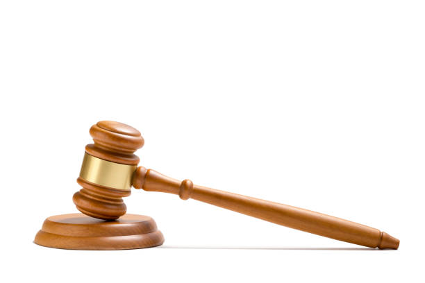 istock Wooden judge gavel isolated on white background. 1142988335