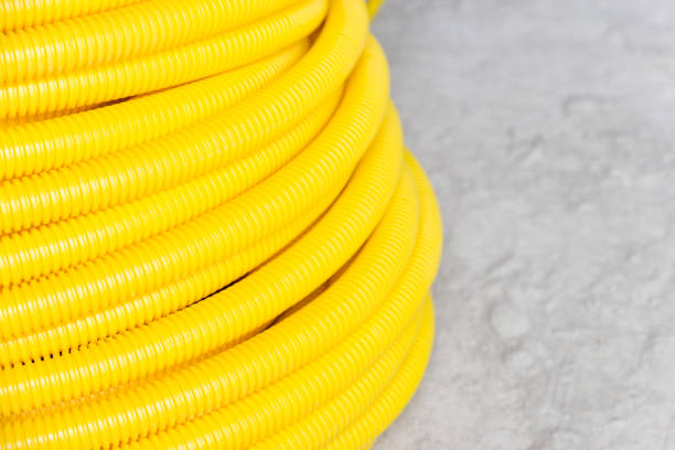Hoses that are part of cement spraying equipment.
