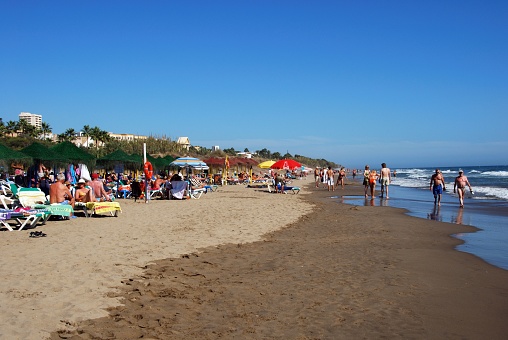 Holidaymakers on the beach, Playa de la Vibora, Elviria, Marbella, Costa del Sol, Malaga Province, Andalucia, Spain.