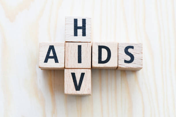 istock AIDS/HIV word on a wooden table .Aids / HIV Concept 1142999210