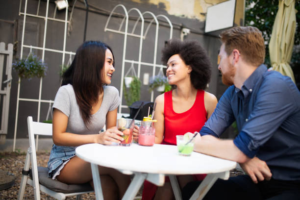 istock Multiracial group of friends having fun and talking 1143000147