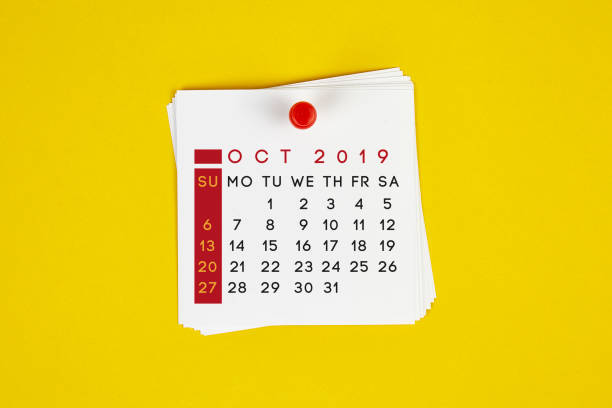 istock Post It October 2019 Calendar On Yellow Background 1143002112