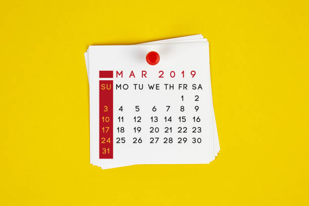 istock Post It March 2019 Calendar On Yellow Background 1143002733