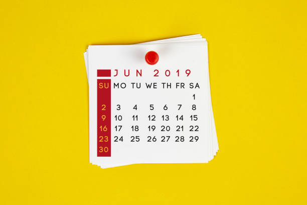 istock Post It June 2019 Calendar On Yellow Background 1143003098