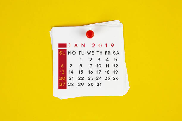 istock Post It January 2019 Calendar On Yellow Background 1143003328