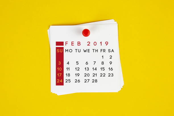 istock Post It February 2019 Calendar On Yellow Background 1143003363