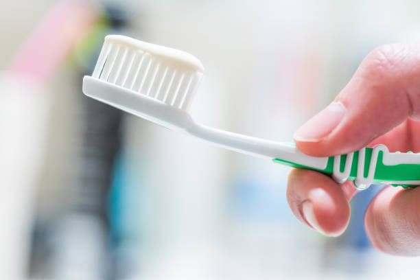 istock Brushing the teeth: Toothbrush in the bathroom 1143003370