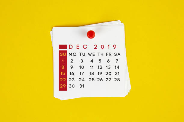 istock Post It December 2019 Calendar On Yellow Background 1143003433