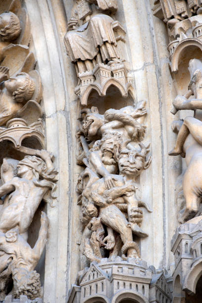 istock Notre dame paris cathedral statue sculpture and roof before fire 1143003636