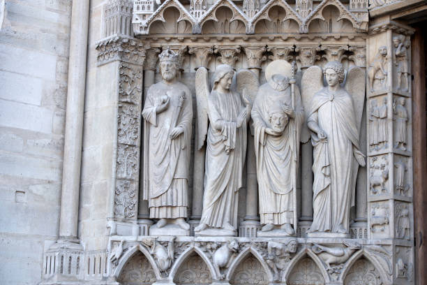 istock Notre dame paris cathedral statue sculpture and roof before fire 1143003710