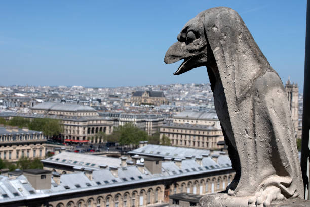 istock Notre dame paris cathedral statue sculpture and roof before fire 1143003948