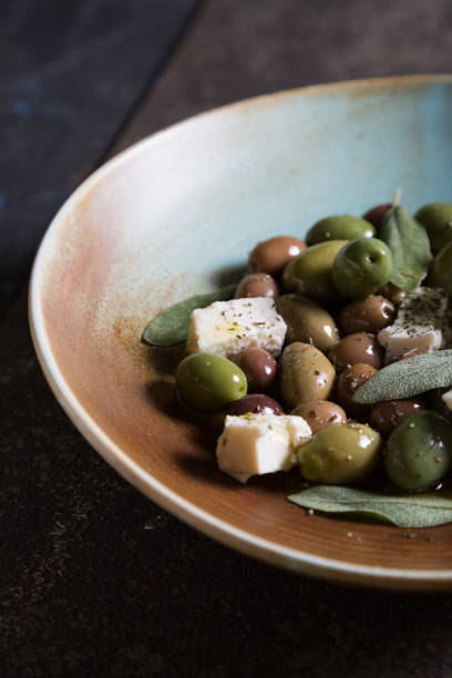 istock Olives with cheese and olive oil 1143004213