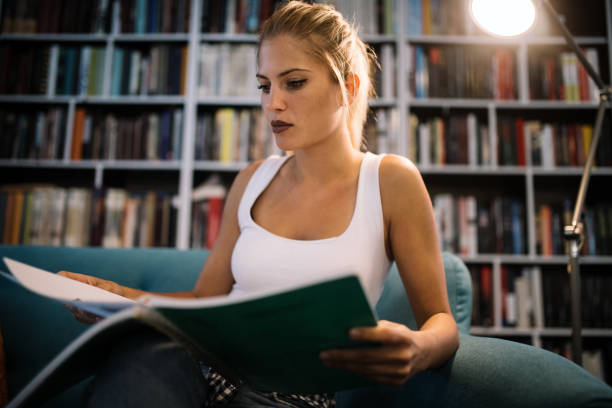 istock Beautiful student woman studying and learning at college 1143005661