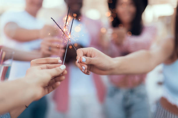 istock Men and ladies holding bengal lights 1143006084