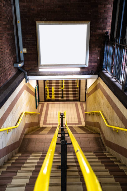 istock Empty Advertisement Poster Above Staircase to Subway 1143006818