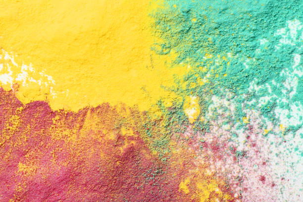 istock Colorful holi powders on white background 1143008038