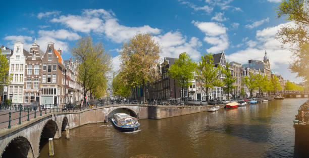 istock Traditional old buildings in Amsterdam 1143009509