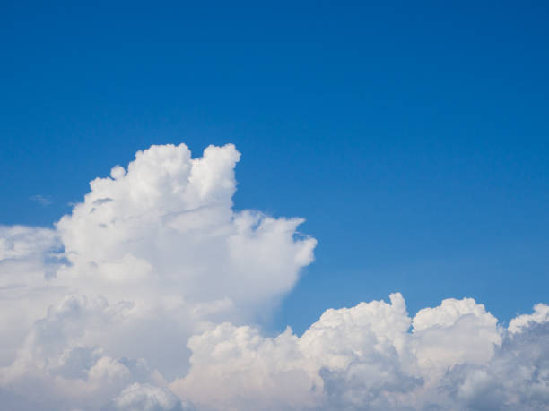 istock Beautiful, cumulus clouds in the blue sky 1143011182