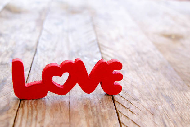 istock word love in red letters on wood table 1143015091