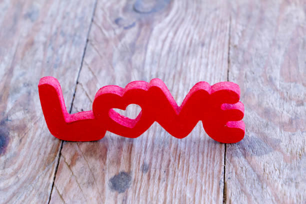 istock word love in red letters on wood table 1143015290