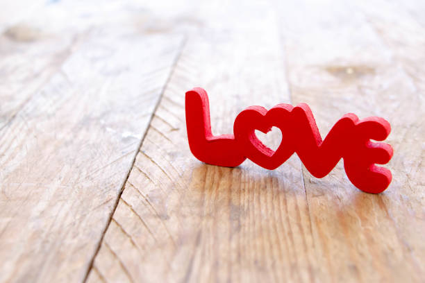 istock word love in red letters on wood table 1143015326