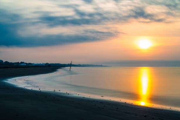 istock summer dawn over the beach in Bibione, Italy 1143015912