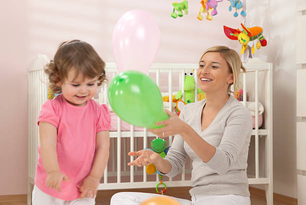 istock Mother Playing With Her Baby 114301633