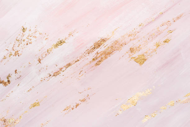 istock pink marble pattern background with gold brushstrokes. Place for your design 1143016778