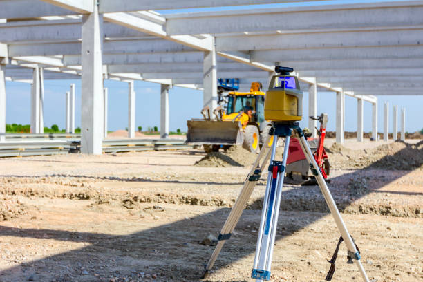 istock Modern device makes topographic measurements with laser, total center on trip 1143016895