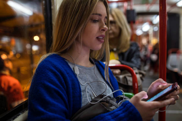 istock Young woman in public transportation 1143017186