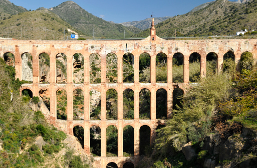 Aquaduct built in the 19 th century to transport water from Nerja to the nearby sugar factory.Close to the national road to Malaga,Spain.