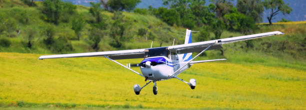 istock Light aircraft landing on aerodrome runway 1143020768