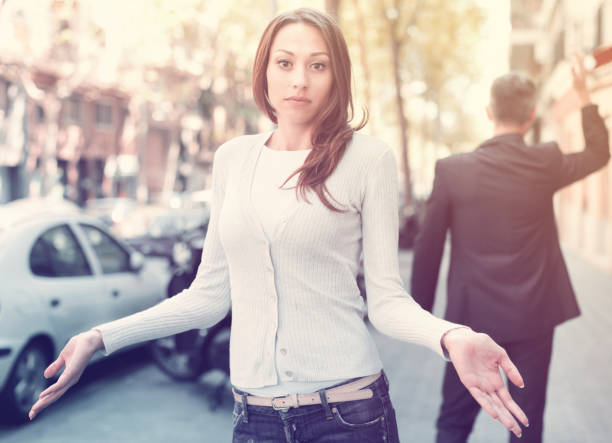 istock Young brunette in quarrel with boyfriend 1143021062