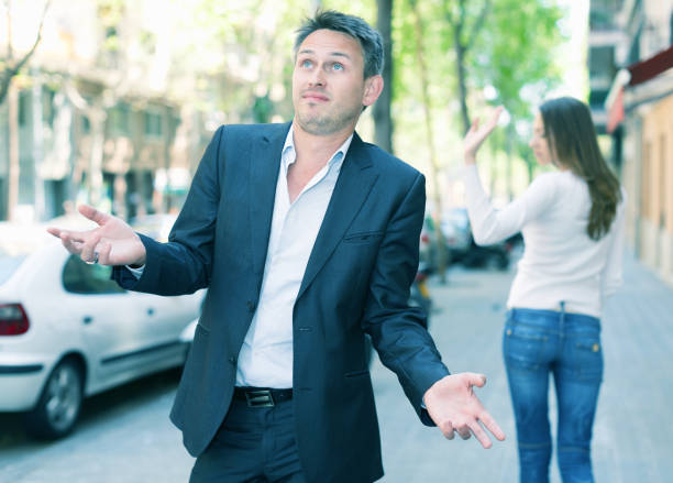istock Disappointed man in quarrel with girlfriend 1143021065