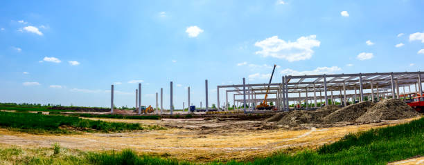 istock Panoramic view on landscape transform into industrial building machinery, people 1143021879