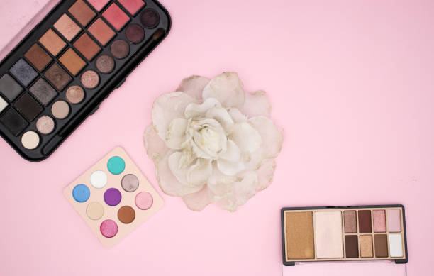istock Woman's accessories and make up products on pink background 1143026196
