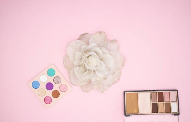 istock Woman's accessories and make up products on pink background 1143027377