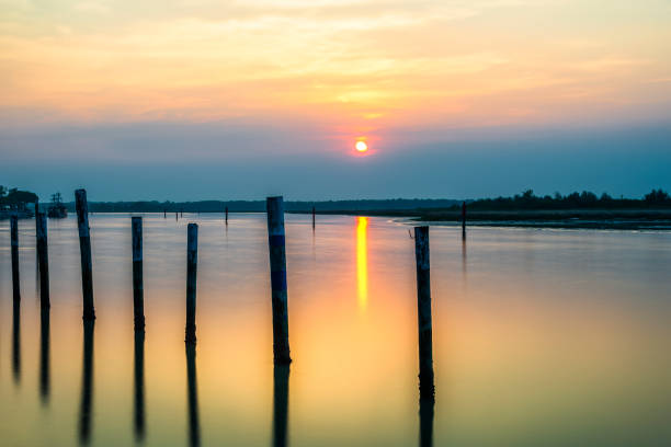 istock summer twilight over Bibione beach, Venice, Italy 1143027611